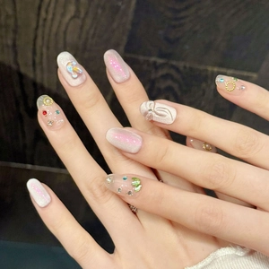 Faux ongles œil de chat rose avec nœud 3D, strass et paillettes de forme ovale
