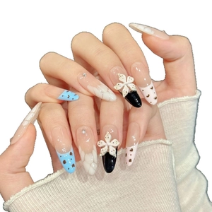 Pink and blue gradient handmade press-on nails with 3D floral and heart rhinestone accents