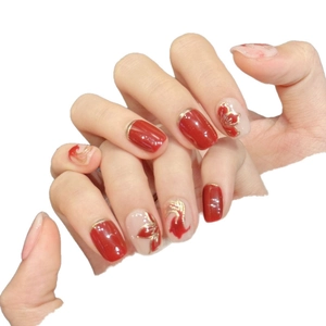 Red and gold gradient press-on nails with koi fish patterns and Chinese style gilding