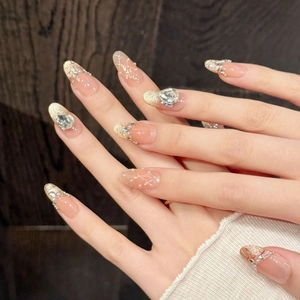 Pink gradient press-on nails with gold glitter, elegant pearls and teardrop rhinestones