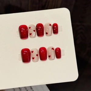 Handmade red heart press-on nails with wine red and creamy white glossy jelly finish