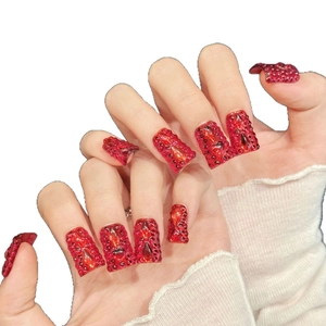 Handmade red press-on nails with luxury crystals and long square shape for women