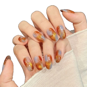 Elegant oval press-on nails with orange and grey-blue marble design and gold foil flakes