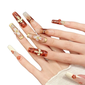 Extra long trapezoid press-on nails with leopard print, 3D cross, and floral accents