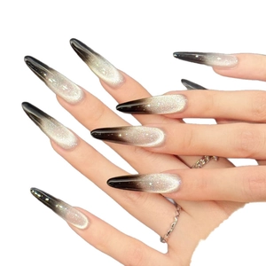 Long almond press-on nails with silver cat-eye gradient and metallic glitter effect