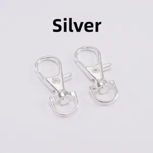 Close-up of a silver lobster clasp with 360-degree swivel D-ring for keychains and bags