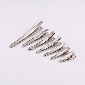 Detailed set of silver alligator hair clips in seven sizes for DIY styling and hair crafts