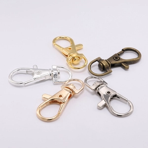 Close-up of swivel lobster clasps in five metal colors for DIY keychain making