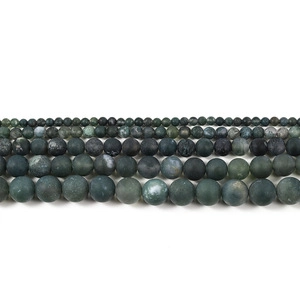 Detailed view of matte moss agate beads showing natural green textures in five sizes