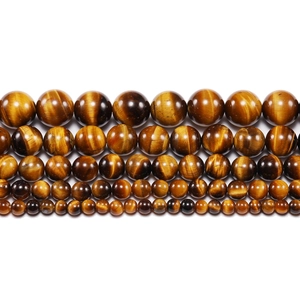 Perles naturelles en œil de tigre jaune de tailles variées avec un éclat poli soyeux