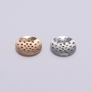 Perforated metal jewelry base plates in rose gold and silver for DIY jewelry crafting
