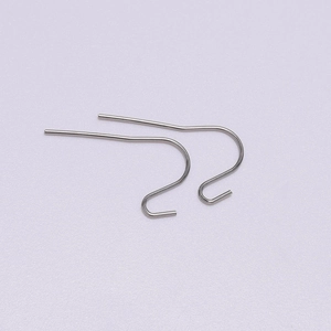 Detailed view of polished stainless steel ear hooks for DIY jewelry making