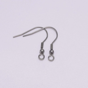 Detailed view of silver stainless steel earring hooks with spring and ball DIY parts