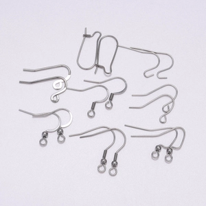 Detailed close-up of various stainless steel earring hooks for DIY jewelry making