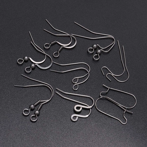 Various gunmetal stainless steel earring hooks for DIY jewelry making on black texture