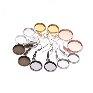 Assorted circular earring trays with hooks in multiple metal finishes for DIY jewelry