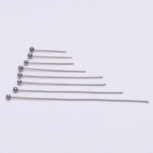 Detail view of 8 different lengths of stainless steel ball pins for DIY jewelry making