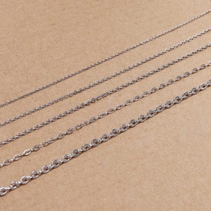 Five assorted sizes of flat silver stainless steel cable chains for DIY jewelry making