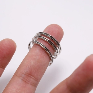 Minimalist silver multi-layer wavy rings set with polished finish for a modern look