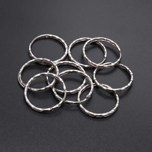 Silver textured nickel-plated iron key rings with embossed hammer pattern for DIY crafts