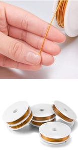 Dettaglio filo d'acciaio dorato da 0,3-1,0 mm su rocchetti bianchi per gioielli DIY