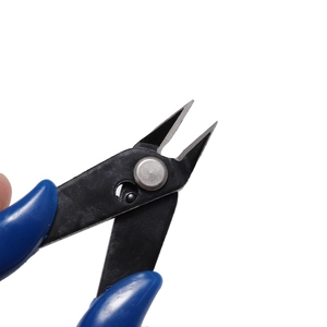 Macro view of blue handled precision wire cutter pliers for jewelry making and DIY crafts