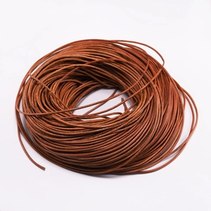 Macro detail of high-quality brown round genuine leather cord for DIY jewelry making