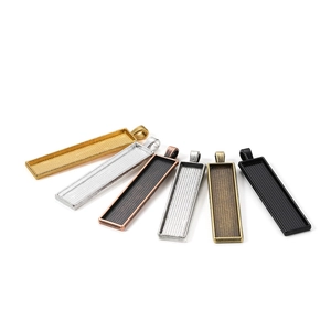 Set di sei basi per ciondoli rettangolari 10x50mm in vari colori metallici per fai da te