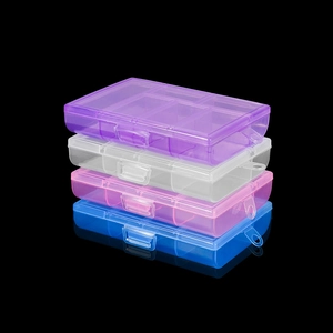 Stack of multi-colored translucent PP plastic jewelry boxes with dividers on black background