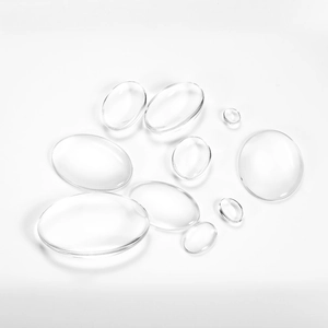 Clear oval glass cabochon tiles for DIY jewelry making and photo settings on white background