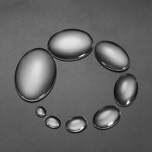 Clear oval glass cabochons in various sizes for DIY jewelry making and craft projects