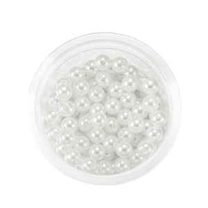 Detailed top view of white ABS round pearls with holes in a transparent plastic storage box