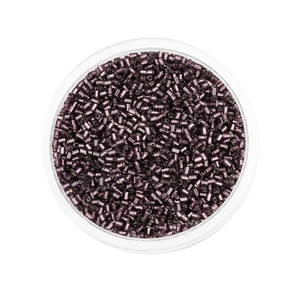 Macro shot of 2mm plum purple glass delica beads with metallic finish for DIY jewelry