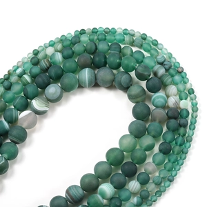 Matte green striped agate beads in various sizes for jewelry making with natural texture