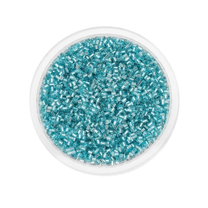 Top view of light blue bugle beads with silver lining for DIY jewelry and embroidery