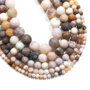 Natural matte bamboo leaf agate round beads in earthy tones for DIY jewelry making