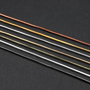 Rotoli di catena a serpente in oro, oro rosa e argento per la creazione di gioielli