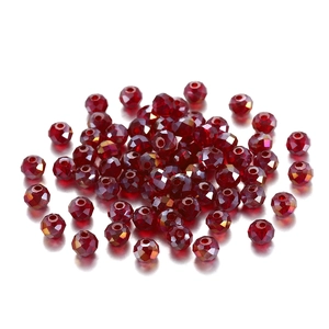 Macro shot of red faceted crystal glass beads with AB colorful coating for DIY jewelry
