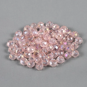 Macro view of multi-faceted light pink crystal ab beads for DIY jewelry making and crafts
