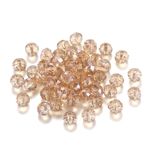 Macro detail of champagne faceted crystal beads with center holes for DIY jewelry making
