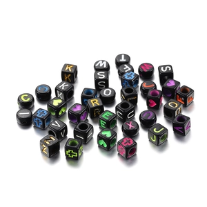 Colorful acrylic alphabet beads and shapes on black square and round beads for DIY jewelry