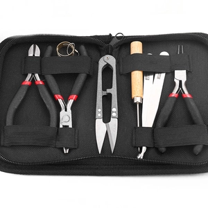 DIY jewelry tool set including pliers, tweezers, and needles in a black zippered pouch