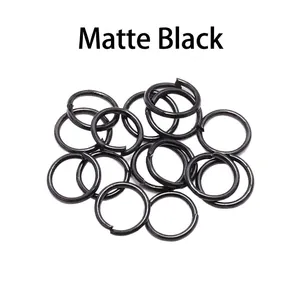 Macro shot of 5mm black coated iron jump rings for DIY jewelry making and necklace linking