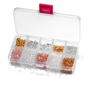 Detailed view of DIY jewelry making kit with crystal beads and metal findings in storage box