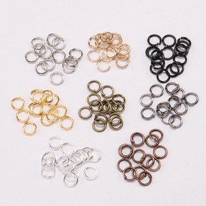 Detailed top view of DIY metal jump rings in eight assorted plating colors for jewelry making