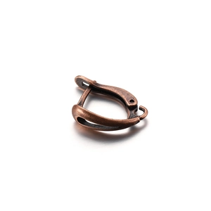 Macro detail of antique bronze lever back ear hook with secure closure for DIY jewelry