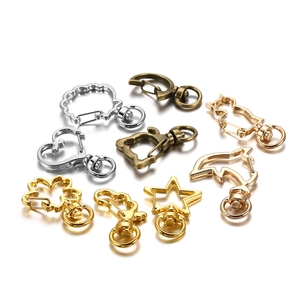 Assorted DIY metal lobster clasps in heart, star, cat, and dolphin shapes for keychains
