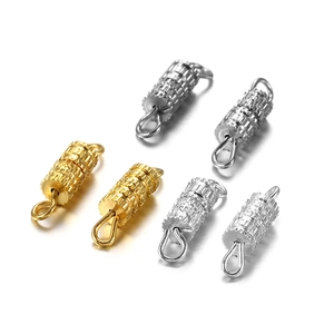 Detail of knurled copper screw clasps for DIY jewelry in gold and silver finishes