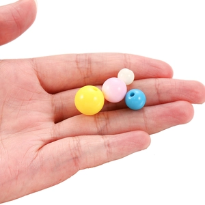 Detailed view of colorful acrylic beads in various sizes for DIY jewelry making