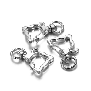 Three silver cat-shaped lobster clasps with rotating rings for DIY jewelry making